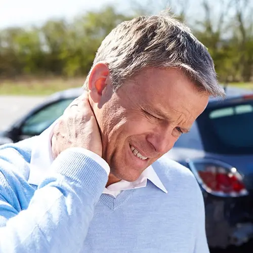 Chiropractic Davenport IA Man With Neck Pain